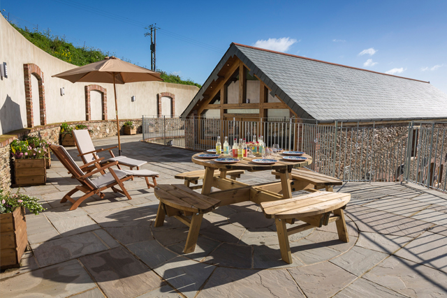 Outdoor eating area at Butterwell Barn, Dartmouth